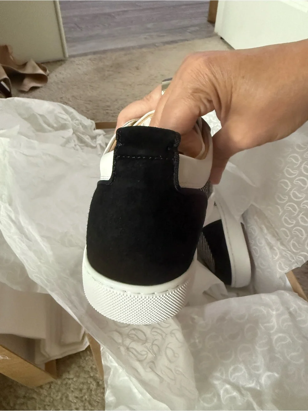 Christian Louboutin bought them